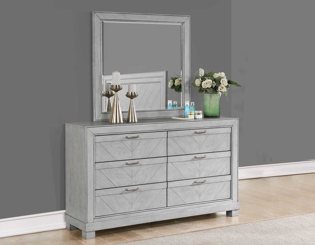 Montana gray 6-drawer dresser with matching mirror in a styled bedroom