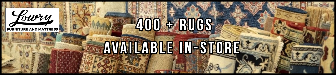 Promotional banner for Lowry Furniture and Mattresses with text about rugs available in-store.